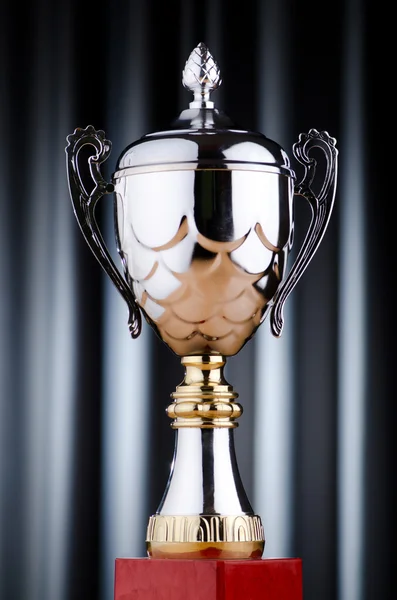 A háttérben díj kupa — Stock Fotó