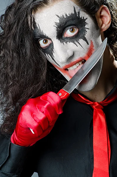 Joker med ansiktsmask i studio — Stockfoto