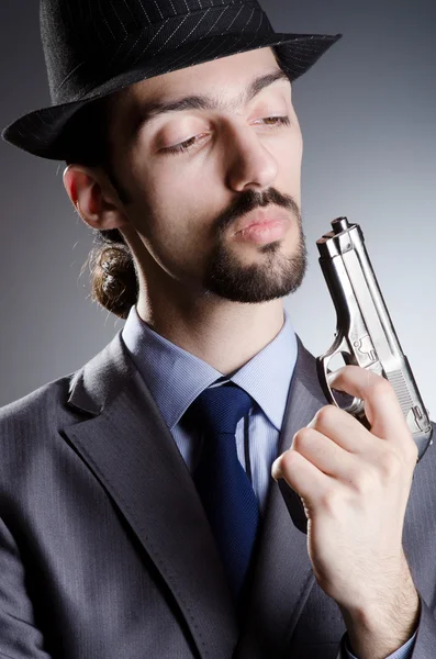 Biznesmen człowiek z ręki pistolet — Zdjęcie stockowe