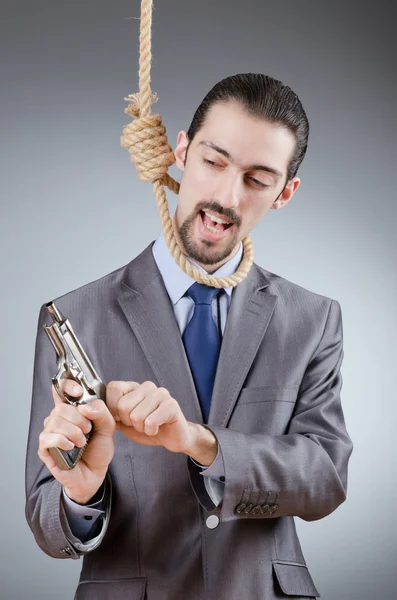 Üzletember ember keze fegyvert — Stock Fotó