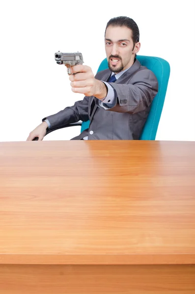Geschäftsmann mit Pistole auf Weiß — Stockfoto
