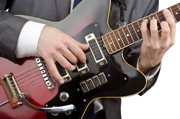 Бизнесмен играет на гитаре на белом — стоковое фото