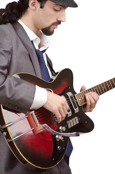 Бизнесмен играет на гитаре на белом — стоковое фото
