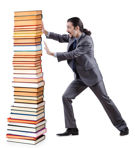Uomo d'affari con libri sul bianco — Foto Stock