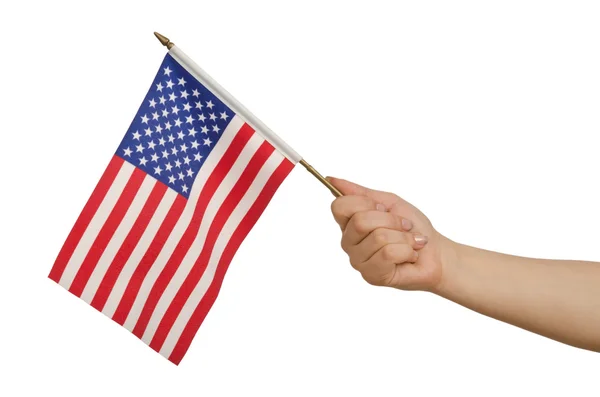 Mão segurando bandeira americana no branco — Fotografia de Stock