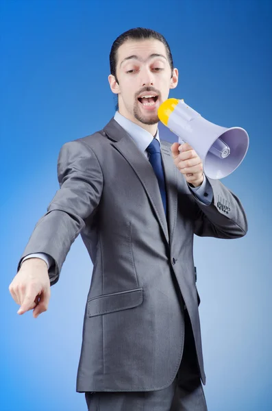 Biznesmen krzyczy przez głośnik — Zdjęcie stockowe