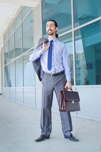 Young businessman on the street Royalty Free Stock Photos