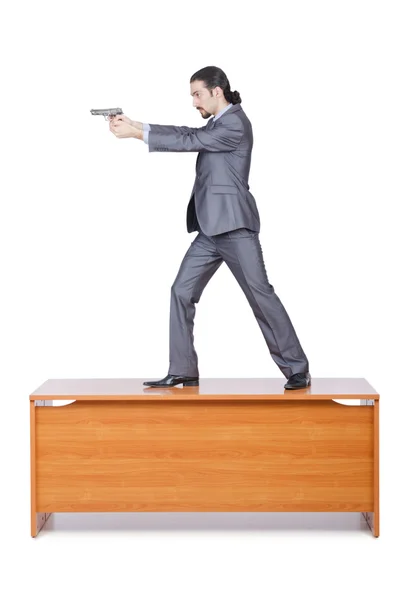 Empresario con pistola en blanco — Foto de Stock