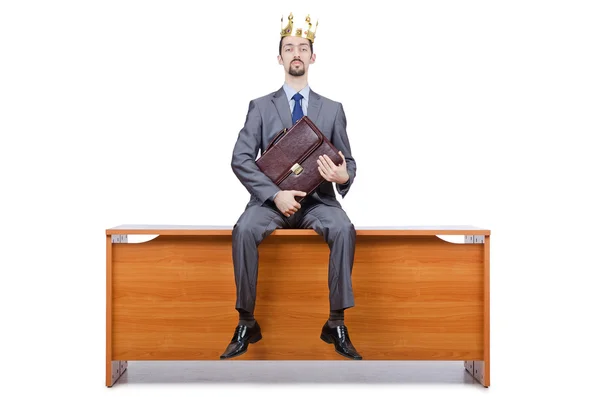 Podnikatel s korunou izolovanou na bílém — Stock fotografie