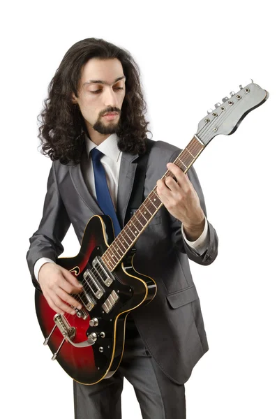 Gitarist in pak op wit — Stockfoto