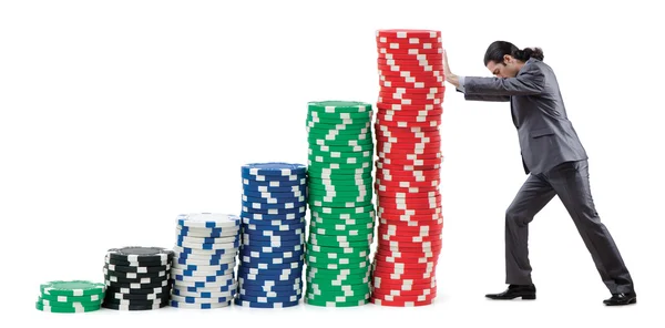 Işadamı ve casino fişleri beyaz — Stok fotoğraf
