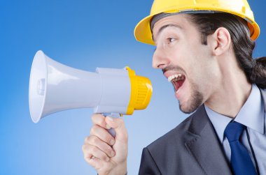 Construction worker shouting via loudspeaker clipart