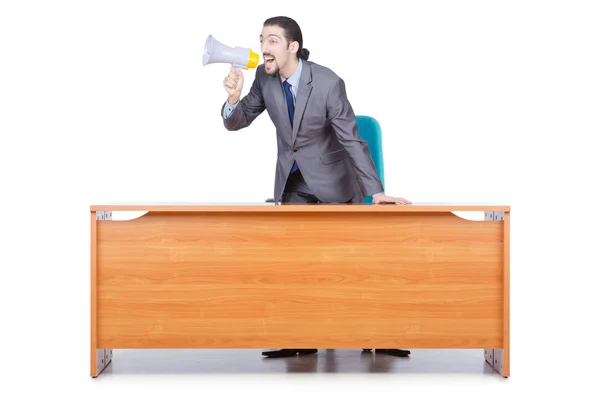 Geschäftsmann mit Lautsprecher am Schreibtisch — Stockfoto