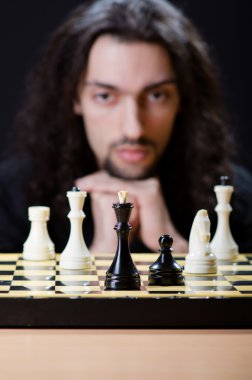 Chess player playing his game clipart