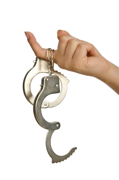 Handcuffed hands on white background — Stock Photo, Image