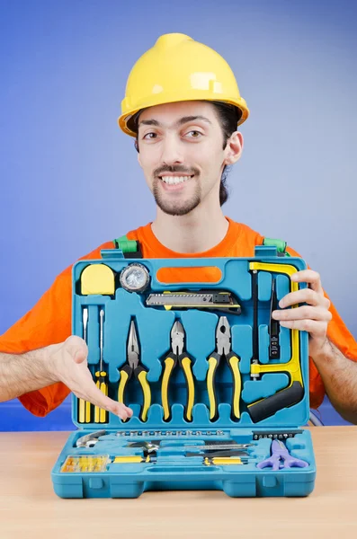 Reparatör med hans toolkit — Stockfoto