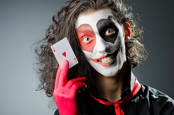 Joker z Maseczka do twarzy w studio — Zdjęcie stockowe