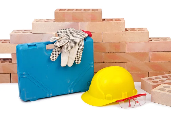 Conceito de construção com capacete e kit de ferramentas — Fotografia de Stock