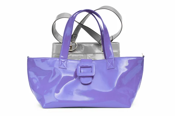 Женский аксессуар - стильная сумка на белом — стоковое фото