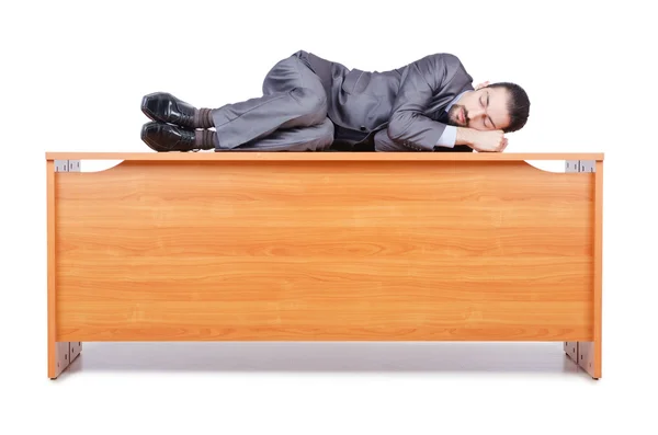 Spanie w tym biurko biznesmen — Zdjęcie stockowe