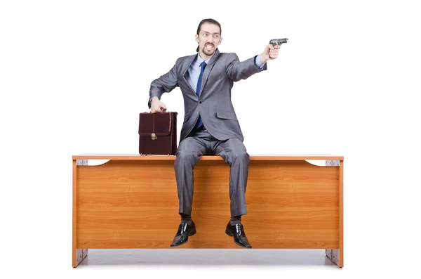 Biznesmen z pistoletu na biały — Zdjęcie stockowe