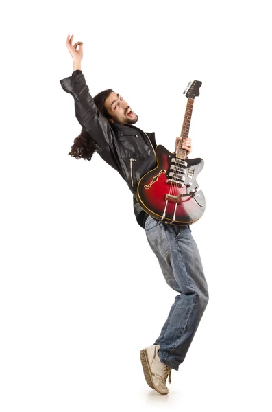 Ung man spelar gitarr på vit — Stockfoto