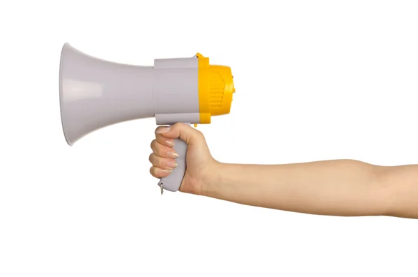 Рука тримає гучномовець на білому — стокове фото