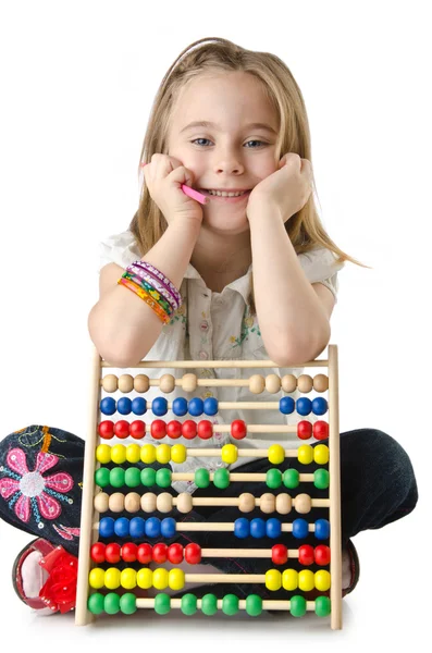 Girl with abacus on white — Stock Photo, Image