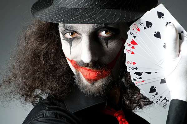 Joker mit Karten im Studio-Shooting — Stockfoto