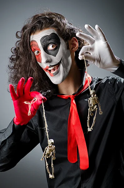 Joker with face mask in studio — Stock Photo, Image