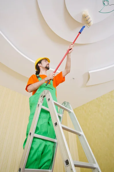 Painter worker during painting job — Stock Photo, Image