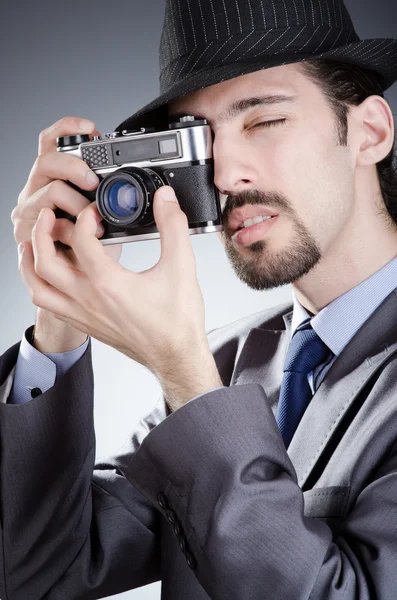 Φωτογράφος άνθρωπος με το εκλεκτής ποιότητας φωτογραφική μηχανή — Φωτογραφία Αρχείου