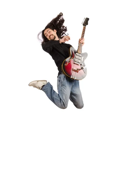 Genç adam beyaz gitar çalmak — Stok fotoğraf