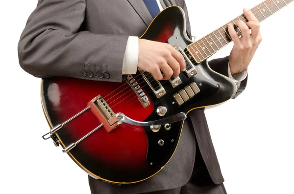 Guitar player in business suit on white — Stock Photo, Image