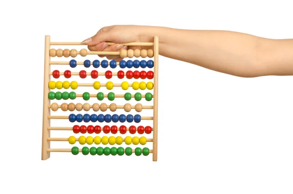 Hand holding abacus on white — Stock Photo, Image