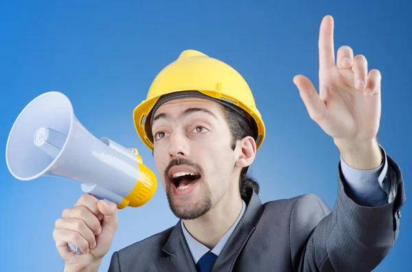 Bauarbeiter ruft über Lautsprecher — Stockfoto