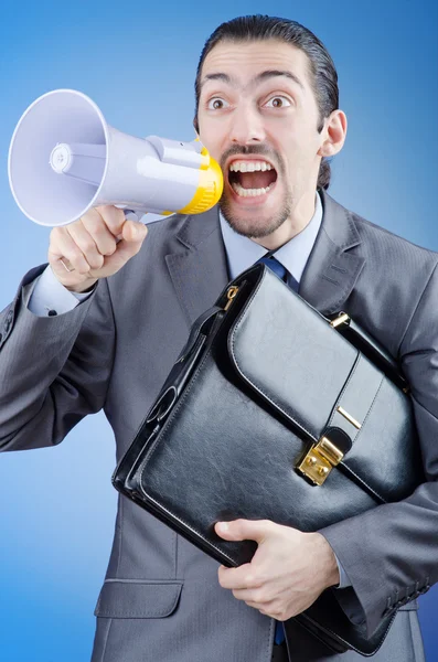 Uomo d'affari che grida via altoparlante — Foto Stock