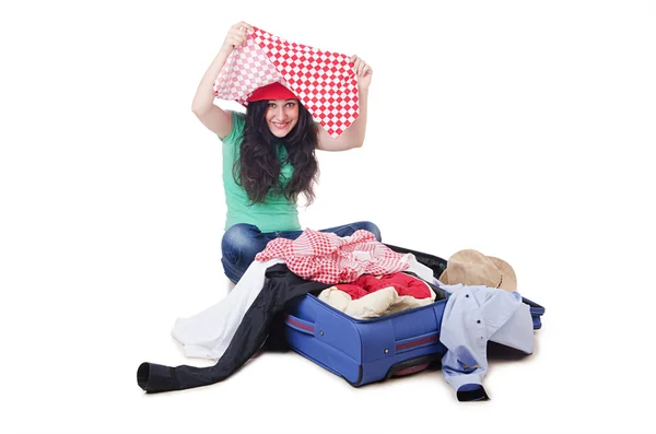Girl packing for travel vacation — Stock Photo, Image