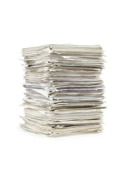 Papierstapel auf weißem Papier — Stockfoto