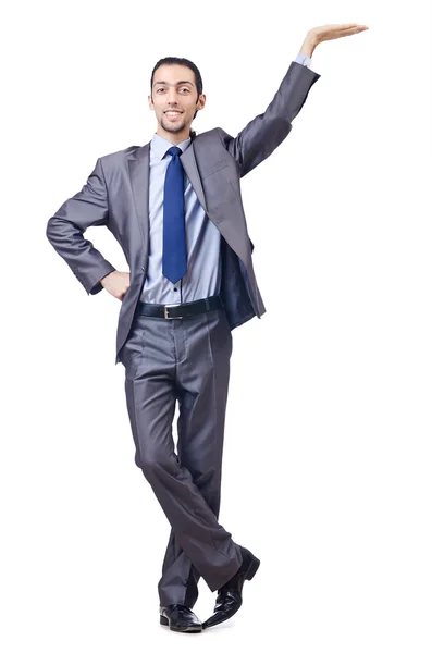 Young businessman pushing invisible obstacles Stock Picture