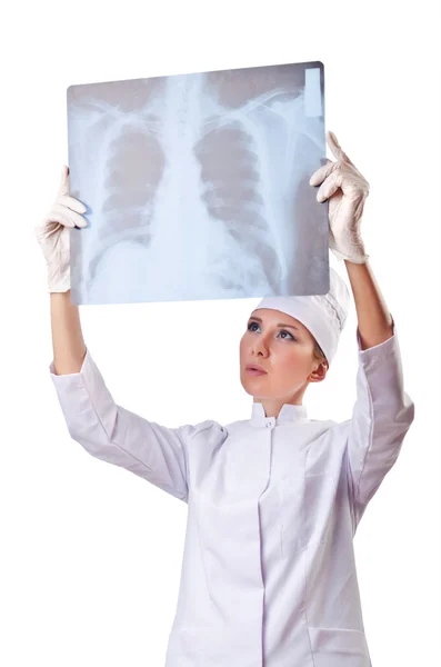 Kobieta lekarz badania rentgenowskie na biały — Zdjęcie stockowe