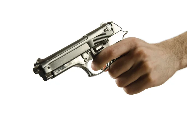 Пистолет в руке на белом — стоковое фото