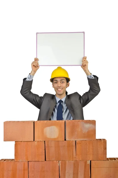 Empresário com tijolos em branco — Fotografia de Stock