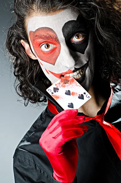 Joker met kaarten in studio shoot — Stockfoto