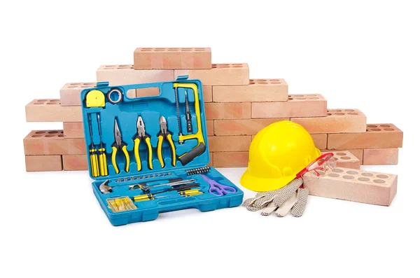 Construction concept with helmet and toolkit — Stock Photo, Image