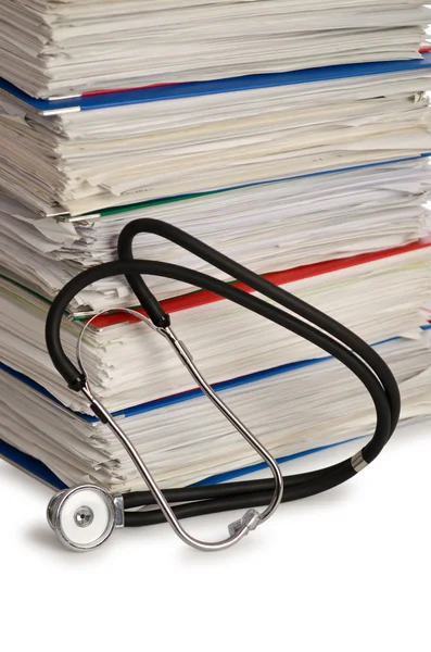 stock image Stack of papers with stethoscope