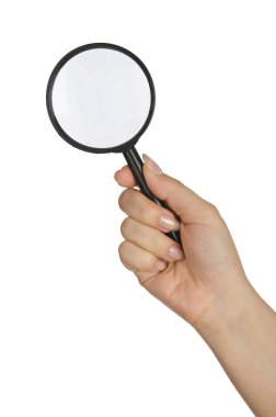 Hand holding magnifying glass on white clipart