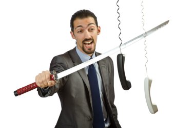 Angry businessman cutting the phone cable clipart