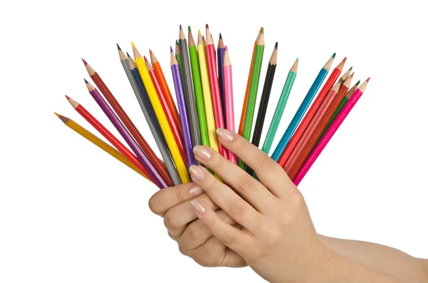 Χέρι που κρατά το χρώμα μολύβια σε λευκό — Φωτογραφία Αρχείου