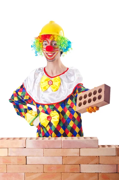 stock image Bad construction concept with clown laying bricks